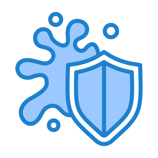 An icon of a blue shield protecting against a splashing liquid, representing stain resistance or stain defense.